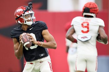 Aug 14, 2025; Fayetteville, AR, USA; Arkansas Razorbacks quarterback Taylen Green (10) drops back to pass during practice. Mandatory Credit: Nelson Chenault-Imagn Images