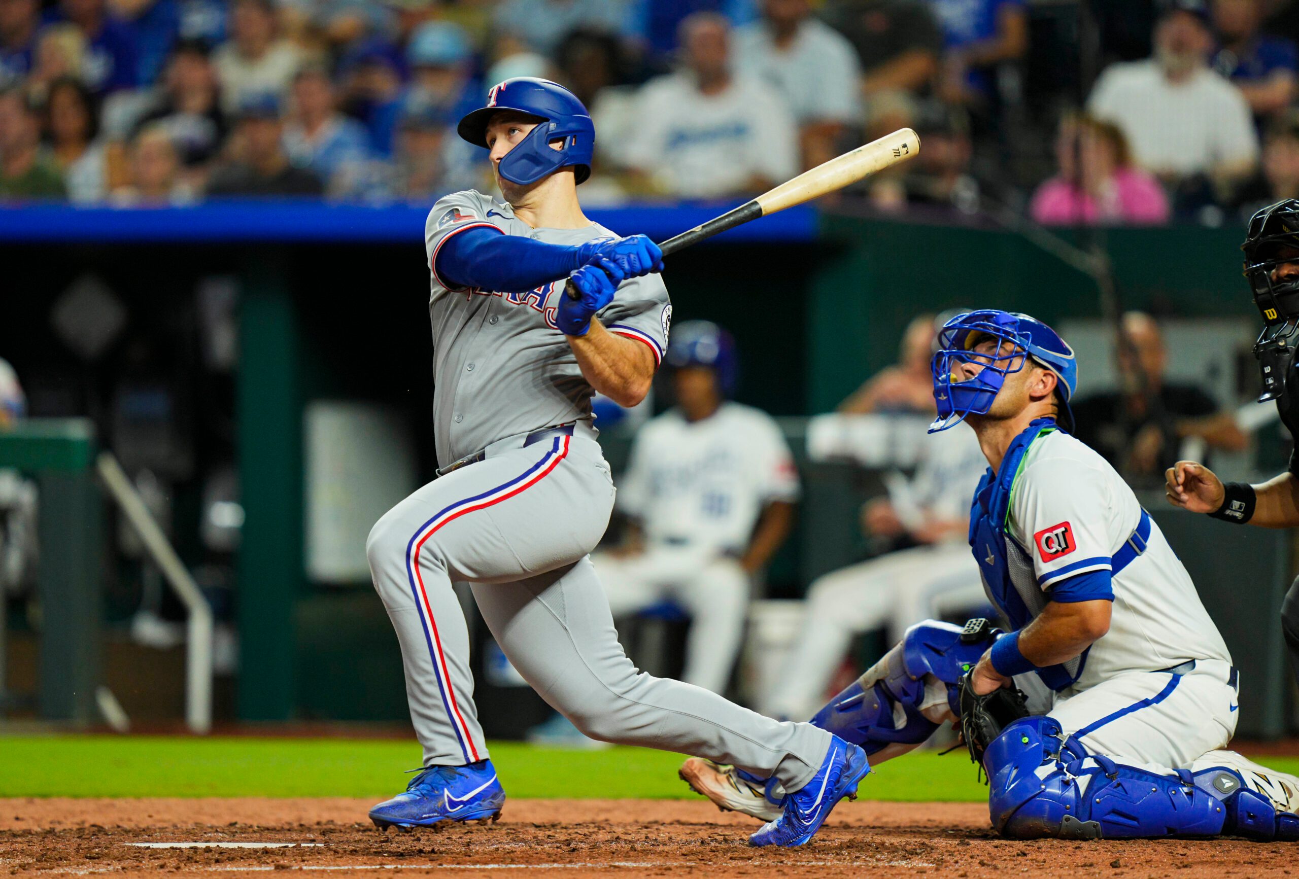 Aug 18, 2025; Kansas City, Missouri, USA; Texas Rangers left fielder Wyatt Langford (36) hits a single during the sixth inning against the Kansas City Royals at Kauffman Stadium. Mandatory Credit: Jay Biggerstaff-Imagn Images