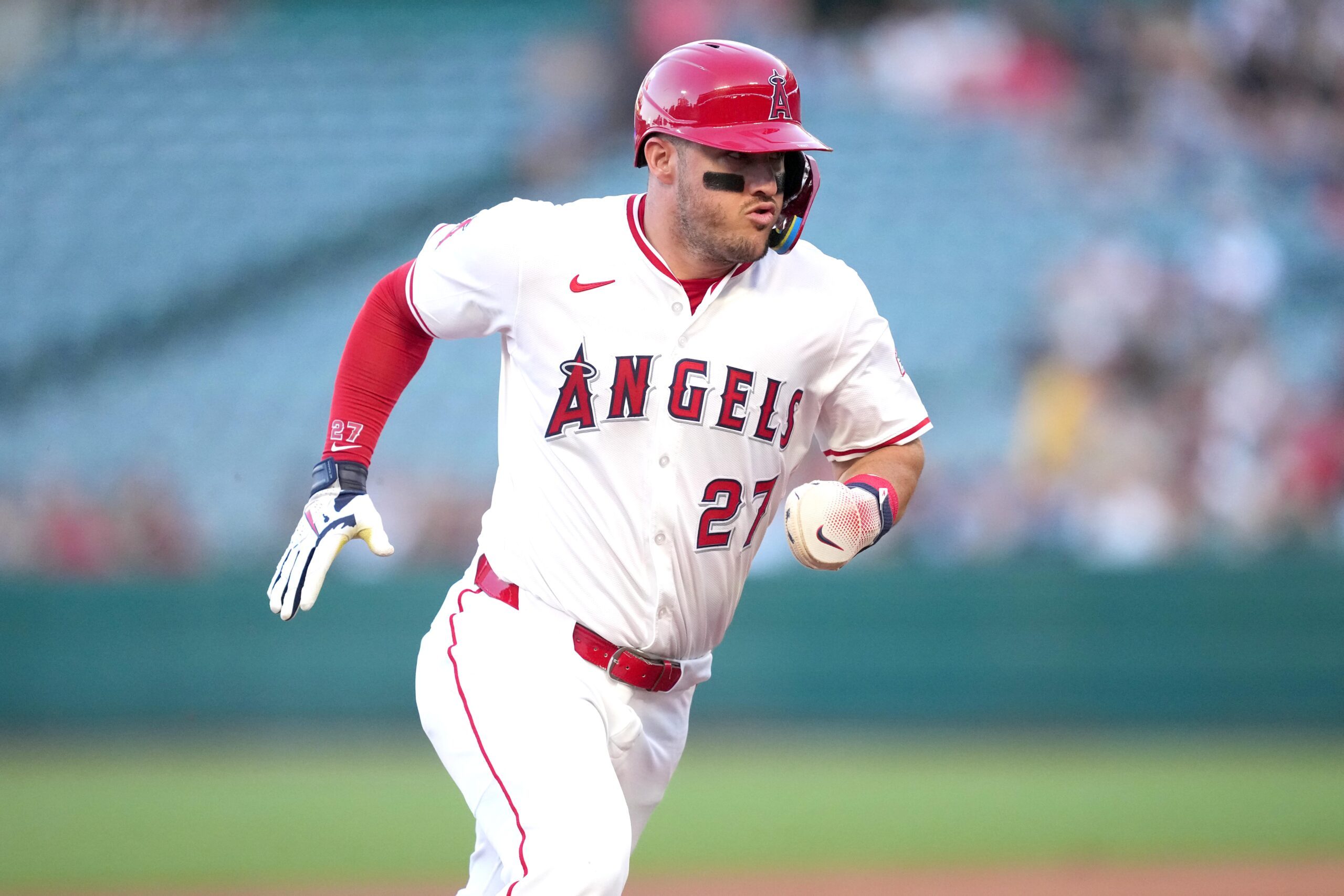 Aug 19, 2025; Anaheim, California, USA; Los Angeles Angels right fielder Mike Trout (27) rounds third base in the first inning against the Cincinnati Reds at Angel Stadium. Mandatory Credit: Kirby Lee-Imagn Images