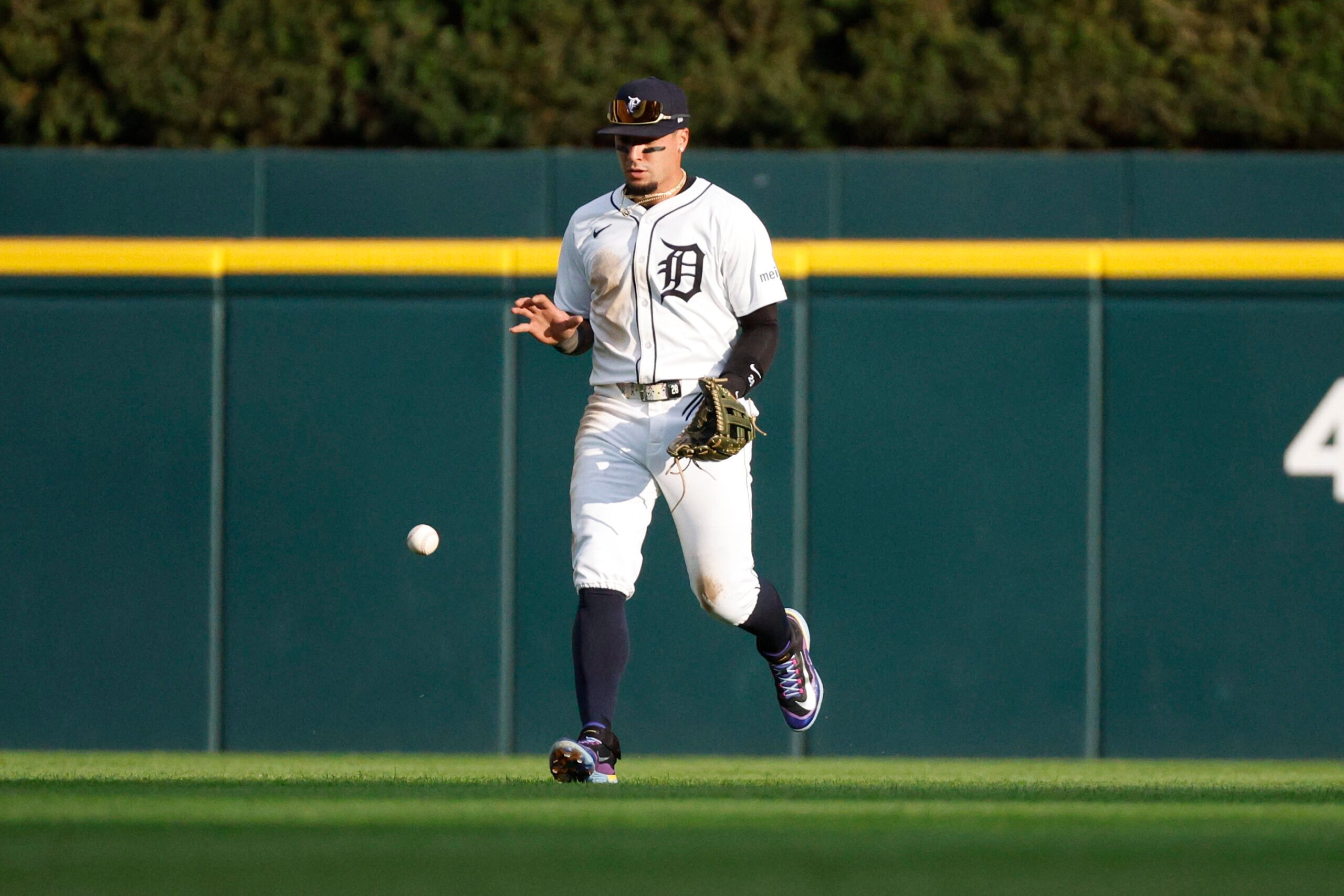 Aug 23, 2025; Detroit, Michigan, USA; Detroit Tigers outfielder Javier Báez (28) retrieves a ground ball hit by Kansas City Royals shortstop Bobby Witt Jr. (7) during the fifth inning at Comerica Park. Mandatory Credit: Brian Bradshaw Sevald-Imagn Images