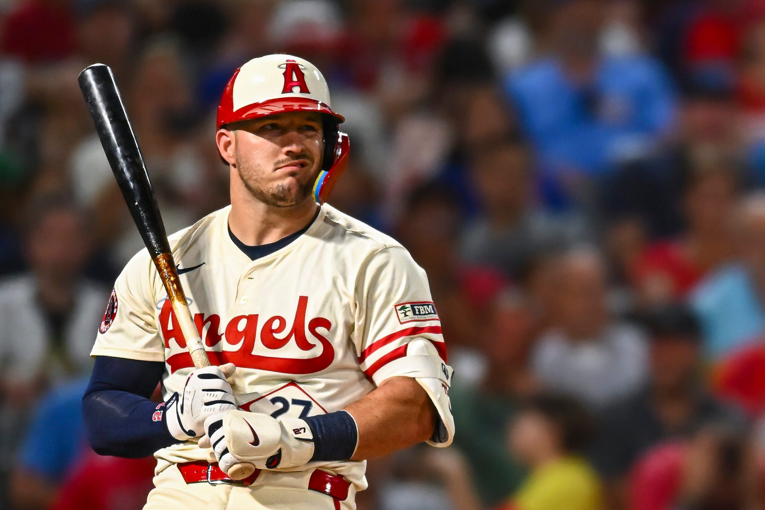 Aug 23, 2025; Anaheim, California, USA; Los Angeles Angels designated hitter Mike Trout (27) reacts after striking out against the Chicago Cubs during the sixth inning at Angel Stadium. Mandatory Credit: Jonathan Hui-Imagn Images