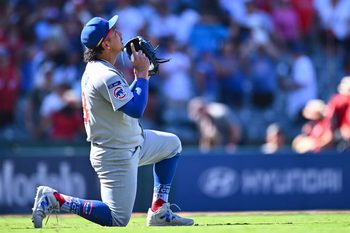 Aug 24, 2025; Anaheim, California, USA; Chicago Cubs pitcher Daniel Palencia (48) reacts after throwing a strike to defeat the Los Angeles Angels during the ninth inning at Angel Stadium. Mandatory Credit: Jonathan Hui-Imagn Images
