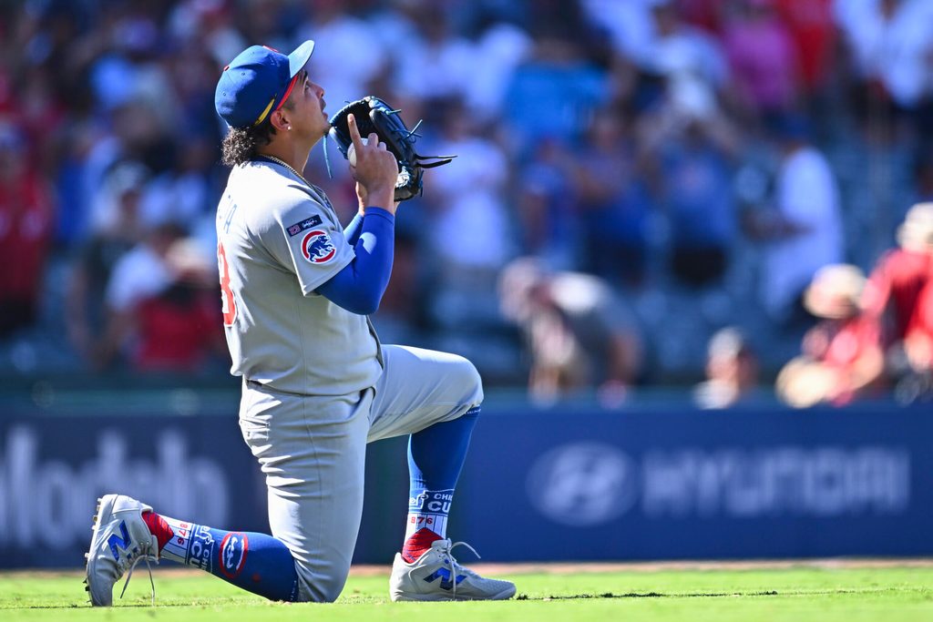 Aug 24, 2025; Anaheim, California, USA; Chicago Cubs pitcher Daniel Palencia (48) reacts after throwing a strike to defeat the Los Angeles Angels during the ninth inning at Angel Stadium. Mandatory Credit: Jonathan Hui-Imagn Images