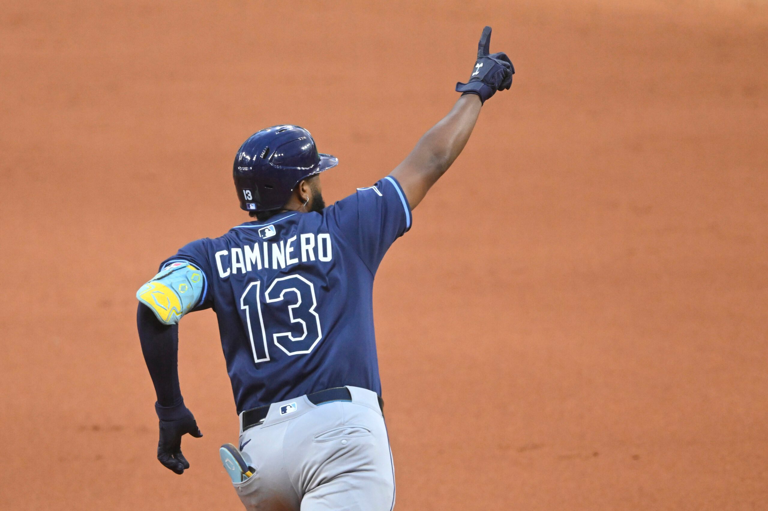 Aug 25, 2025; Cleveland, Ohio, USA; Tampa Bay Rays third baseman Junior Caminero (13) celebrates his two-run home run in the fifth inning against the Cleveland Guardians at Progressive Field. Mandatory Credit: David Richard-Imagn Images