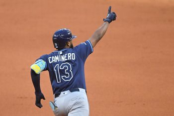 Aug 25, 2025; Cleveland, Ohio, USA; Tampa Bay Rays third baseman Junior Caminero (13) celebrates his two-run home run in the fifth inning against the Cleveland Guardians at Progressive Field. Mandatory Credit: David Richard-Imagn Images