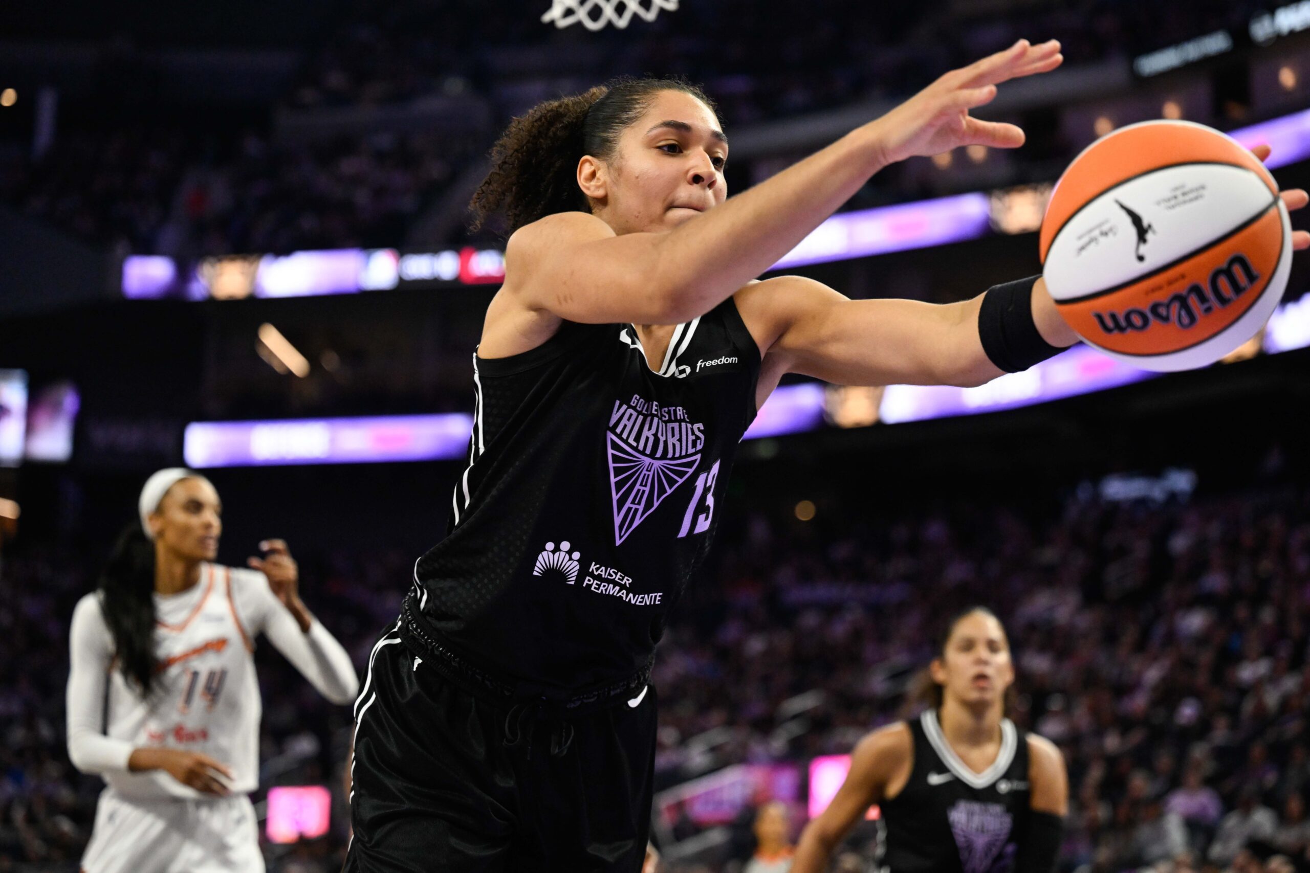 Aug 19, 2025; San Francisco, California, USA; Golden State Valkyries forward Janelle Salaun (13) attempts to save an out of bounds ball against the Phoenix Mercury in the second quarter at Chase Center. Mandatory Credit: Eakin Howard-Imagn Images