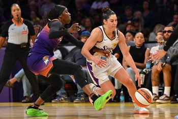 Aug 26, 2025; Los Angeles, California, USA; Los Angeles Sparks guard Kelsey Plum (10) is defended by Phoenix Mercury guard Kahleah Copper (2) during the second half at Crypto.com Arena. Mandatory Credit: Jayne Kamin-Oncea-Imagn Images