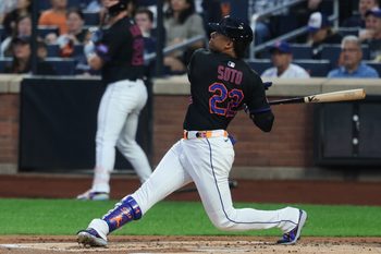 Aug 29, 2025; New York City, New York, USA; New York Mets right fielder Juan Soto (22) hits a two run home run during the first inning against the Miami Marlins at Citi Field. Mandatory Credit: Vincent Carchietta-Imagn Images