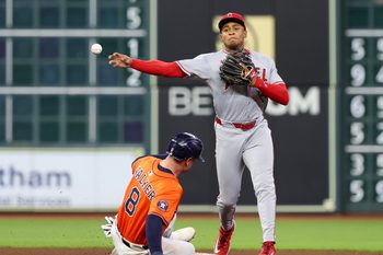 Aug 29, 2025; Houston, Texas, USA; Los Angeles Angels second baseman Christian Moore (4) forces Houston Astros first baseman Christian Walker (8) out at second base but can’t turn the double play in time in the sixth inning at Daikin Park. Mandatory Credit: Thomas Shea-Imagn Images