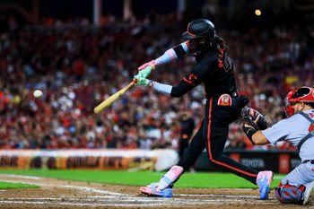 Aug 29, 2025; Cincinnati, Ohio, USA; Cincinnati Reds shortstop Elly De La Cruz (44) hits a triple in the seventh inning against the St. Louis Cardinals at Great American Ball Park. Mandatory Credit: Katie Stratman-Imagn Images