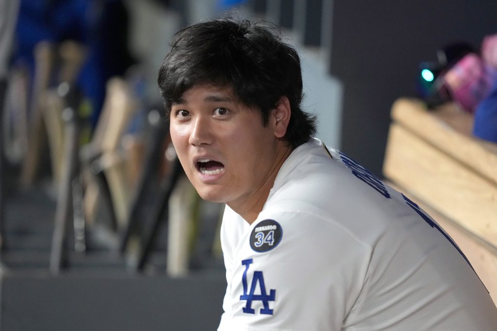 Aug 29, 2025; Los Angeles, California, USA; Los Angeles Dodgers designated hitter Shohei Ohtani (17) watches from the dugout against the Arizona Diamondbacks at Dodger Stadium. Mandatory Credit: Kirby Lee-Imagn Images