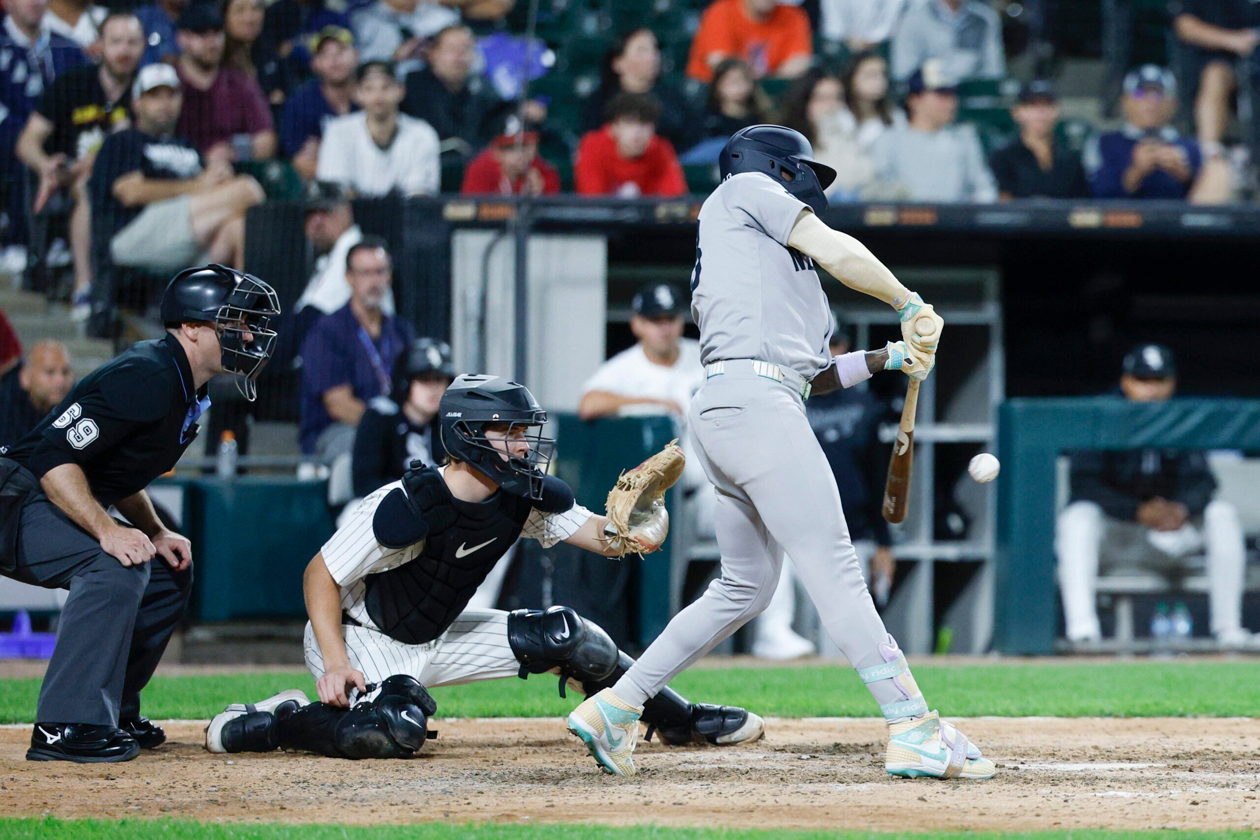 Aug 30, 2025; Chicago, Illinois, USA; New York Yankees second baseman Jazz Chisholm Jr. (13) hits one-run double against the Chicago White Sox during the 11th inning at Rate Field. Mandatory Credit: Kamil Krzaczynski-Imagn Images