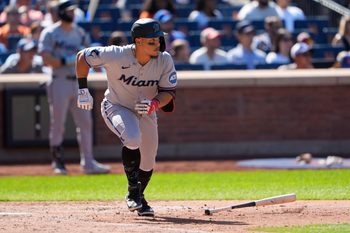 Aug 31, 2025; New York City, New York, USA; Miami Marlins left fielder Heriberto Hernandez (64) runs out a single against the New York Mets during the sixth inning at Citi Field. Mandatory Credit: Gregory Fisher-Imagn Images