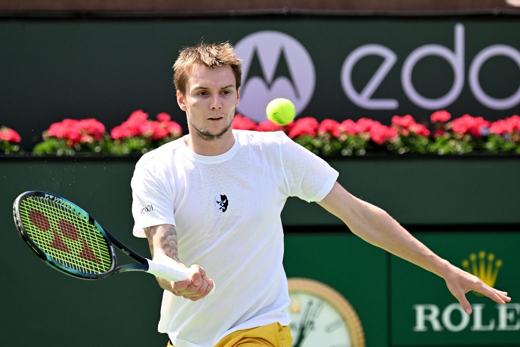 Mar 13, 2022; Indian Wells, CA, USA; Alexander Bublik (KAZ) hits a shot against Andy Murray (GBR) during a second round match at the BNP Paribas Open at the Indian Wells Tennis Garden. Mandatory Credit: Jayne Kamin-Oncea-Imagn Images