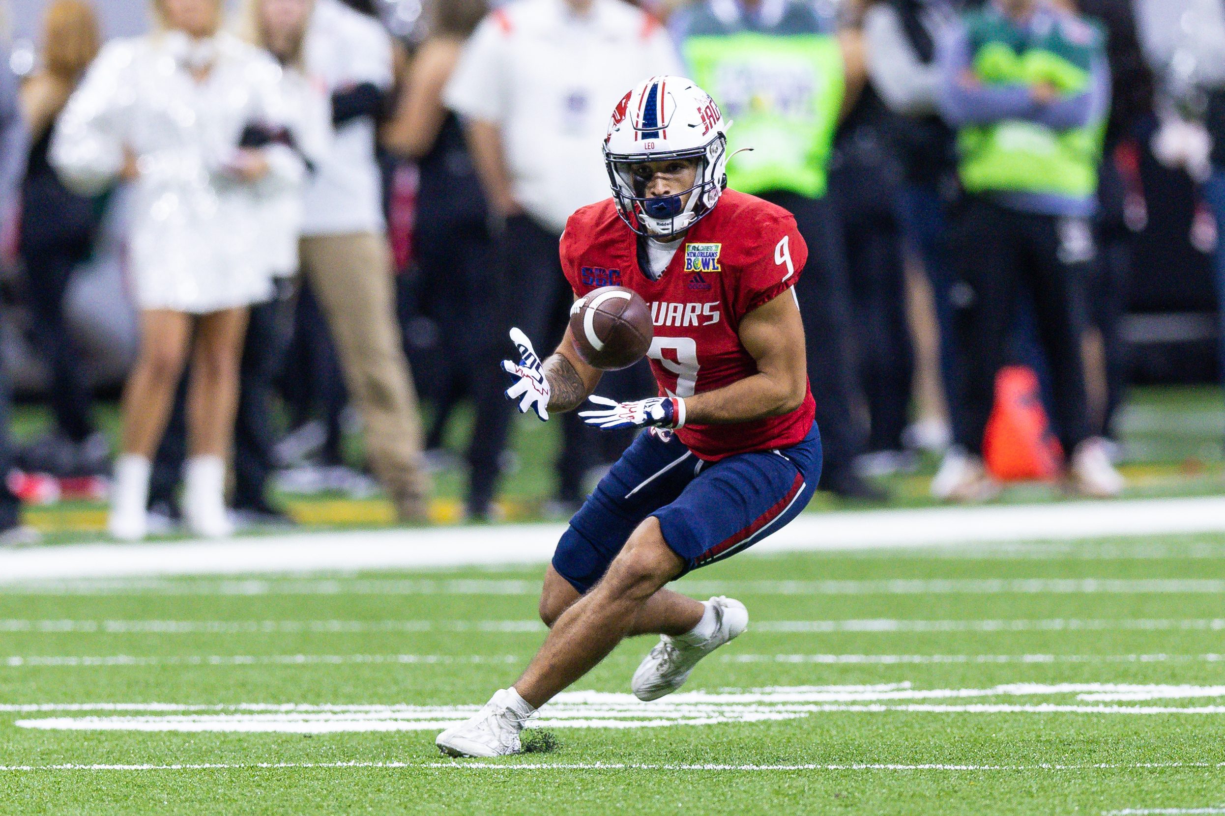 Dec 21, 2022; New Orleans, Louisiana, USA;  South Alabama Jaguars wide receiver Devin Voisin (9) catches a pass against the Western Kentucky Hilltoppers during the first half at Caesars Superdome. Mandatory Credit: Stephen Lew-Imagn Images