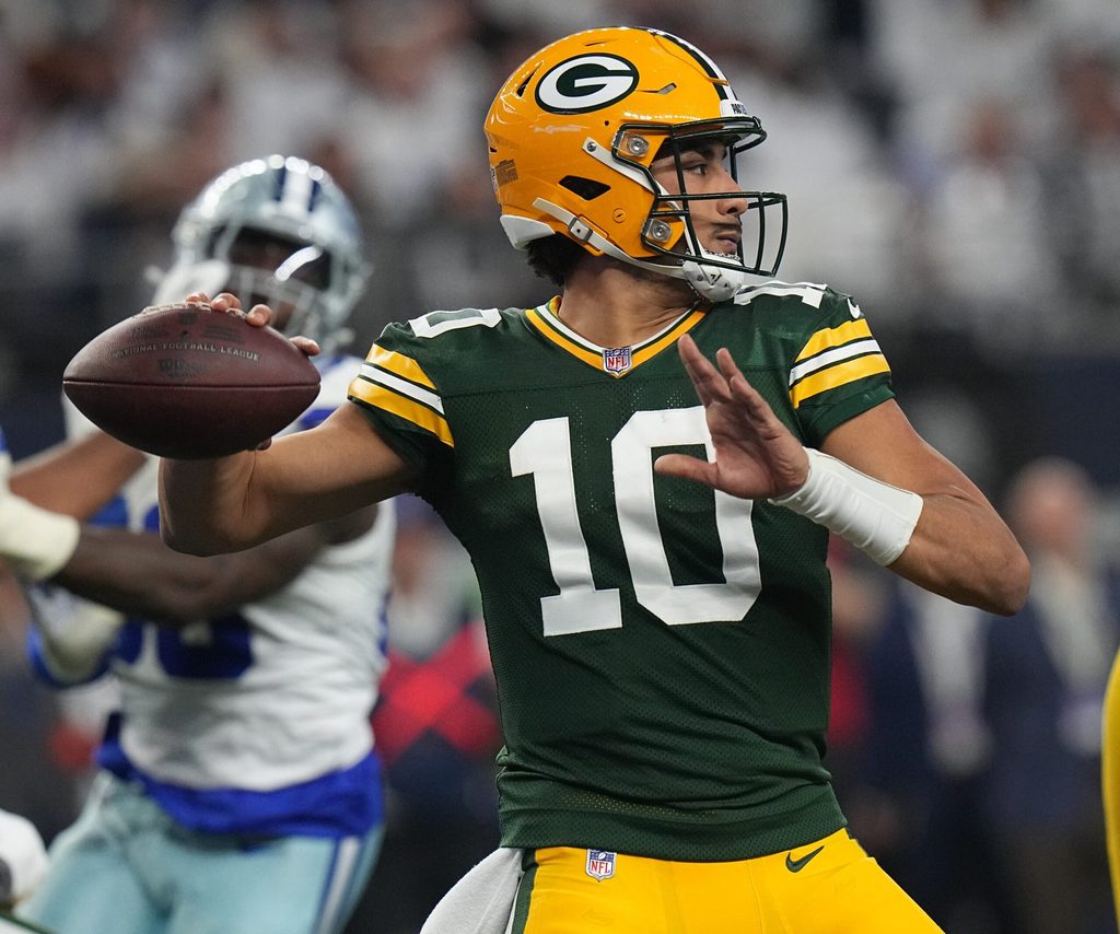 Green Bay Packers quarterback Jordan Love (10) throws a pass during the second quarter of the wild card playoff game against the Dallas Cowboys Sunday, January 14, 2024 at AT&T Stadium in Arlington, Texas.