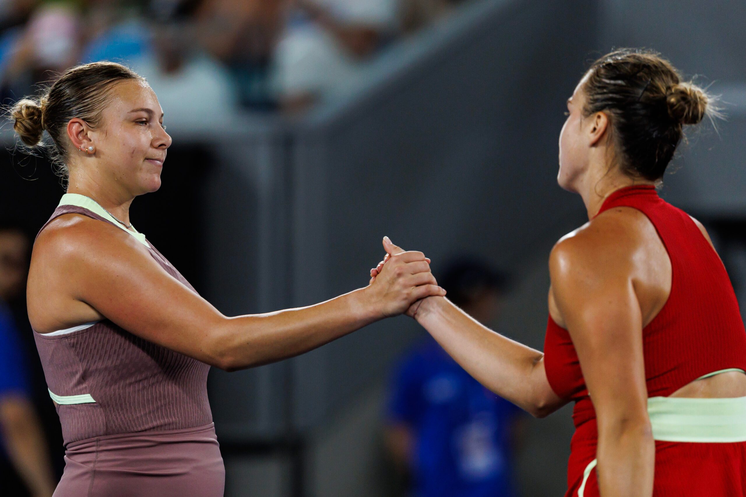 Jan 21, 2024; Melbourne, Victoria, Australia; Amanda Anisimova of the United States shakes hands with Arnya Sabalenka of Belarus after losing to her in in the forth round of the women s singles at the Australian Open 2024. Mandatory Credit: Mike Frey-Imagn Images