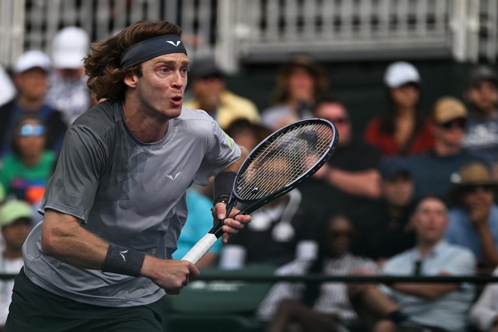 Mar 10, 2024; Indian Wells, CA, USA; Andrey Rublev runs to the net in his third round match against Jiri Lehecka (CZE) during the BNP Paribas Open at Indian Wells Tennis Garden. Mandatory Credit: Jonathan Hui-Imagn Images