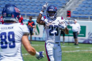Running back Gemari Sands (23) celebrates a touchdown during the Spring Game at FAU Stadium on Saturday, April 13, 2024, in Boca Raton, FL.