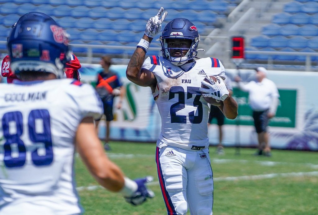 Running back Gemari Sands (23) celebrates a touchdown during the Spring Game at FAU Stadium on Saturday, April 13, 2024, in Boca Raton, FL.