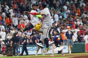 Apr 17, 2024; Houston, Texas, USA;Atlanta Braves designated hitter Marcell Ozuna (20) and right fielder Ronald Acuna Jr. (13) celebrate the win against the Houston Astros  Minute Maid Park. Mandatory Credit: Thomas Shea-Imagn Images