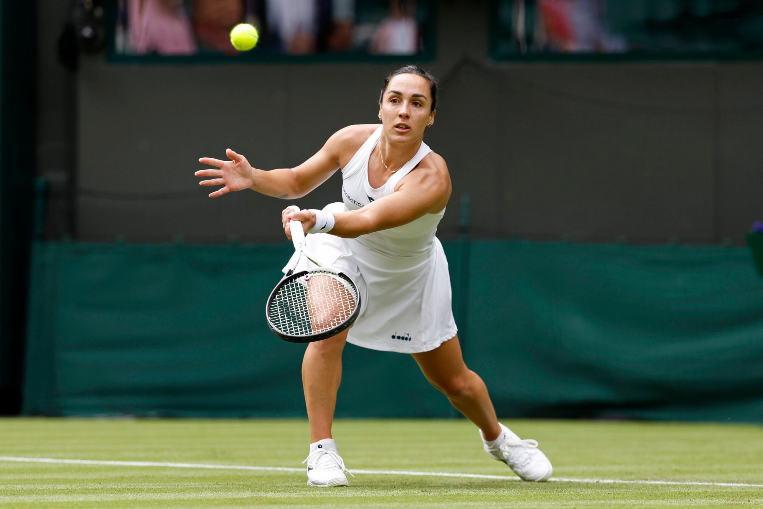 Jul 1, 2024; London, United Kingdom, Martina Trevisan (ITA) hits a forehand against Madison Keys (USA (not pictured) in a ladies singles match on day 1 in The Championships Wimbledon at the All England Lawn Tennis and Croquet Club. Mandatory Credit: Geoff Burke-Imagn Images