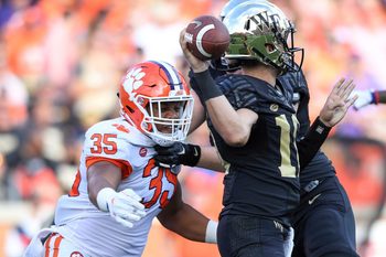 Clemson linebacker Justin Foster (35) pressures Wake Forest quarterback Sam Hartman (10) during the 2nd quarter at BB&T Field in Winston Salem, N.C. Saturday, October 6, 2018.