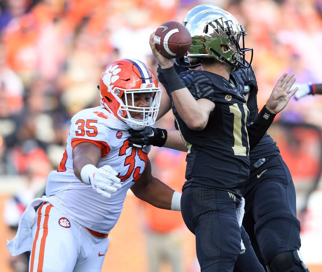 Clemson linebacker Justin Foster (35) pressures Wake Forest quarterback Sam Hartman (10) during the 2nd quarter at BB&T Field in Winston Salem, N.C. Saturday, October 6, 2018.
