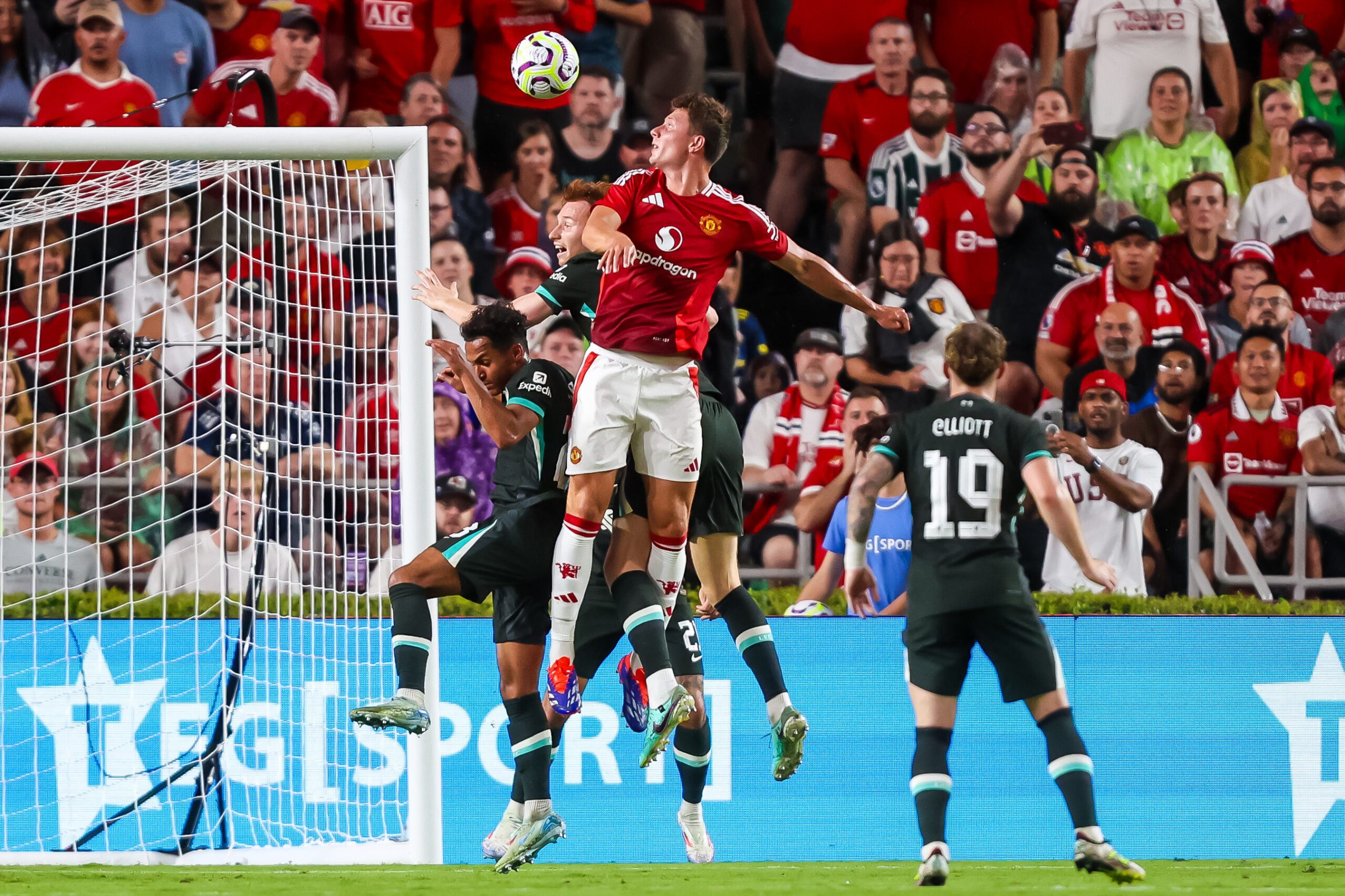 Aug 3, 2024; Columbia, South Carolina, USA; Manchester United midfielder Casemiro (18) heads the ball against Liverpool in the second half at Williams-Brice Stadium. Mandatory Credit: Jeff Blake-Imagn Images