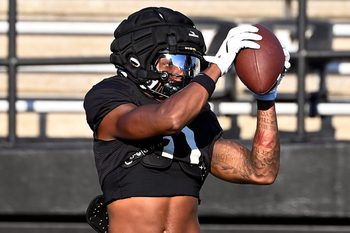 Vanderbilt wide receiver Junior Sherrill (0) catches a pass before an NCAA college football scrimmage Saturday, Aug. 10, 2024, in Nashville, Tenn.