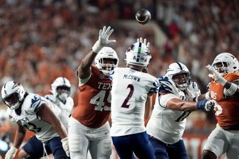 Sep 14, 2024; Austin, Texas, USA; Texas Longhorns defensive lineman Vernon Broughton (45) defends a pass by Texas-San Antonio Roadrunners quarterback Owen McCown (2) during the second half at Darrell K Royal-Texas Memorial Stadium. Mandatory Credit: Scott Wachter-Imagn Images