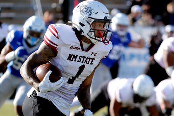 New Mexico State running back Seth McGowan (1) carries the ball during the season final home football game for Middle Tennessee, on Saturday, Nov. 23, 2024.