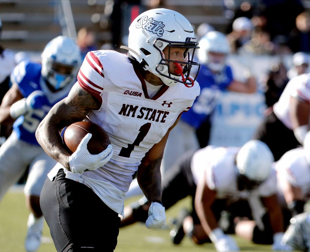 New Mexico State running back Seth McGowan (1) carries the ball during the season final home football game for Middle Tennessee, on Saturday, Nov. 23, 2024.