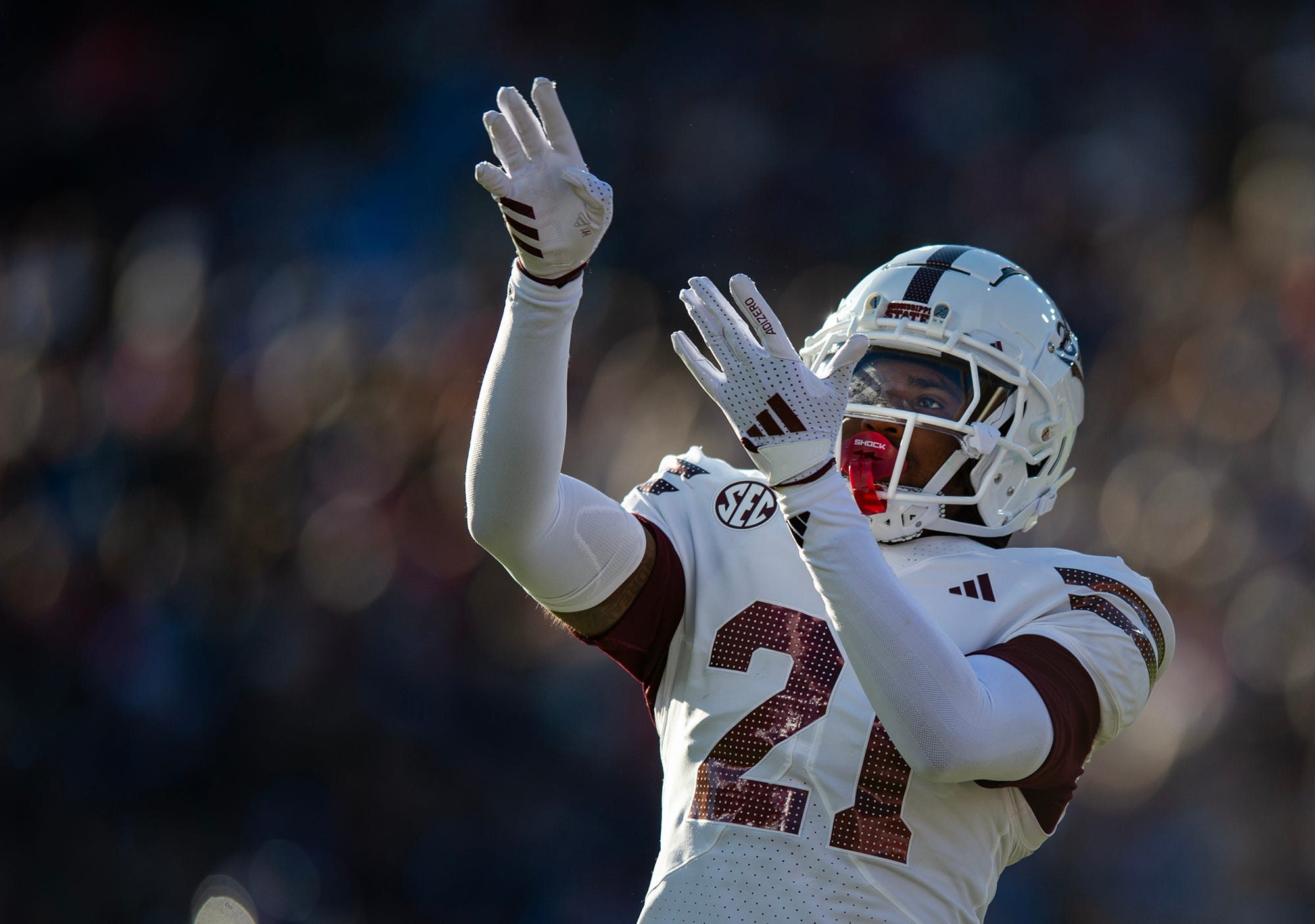 Mississippi State's running back Davon Booth (21) celebrates a touchdown during the Egg Bowl game against Mississippi at Vaught-Hemingway Stadium on Friday, Nov. 29, 2024.