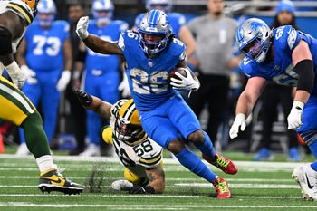 Dec 5, 2024; Detroit, Michigan, USA;  Detroit Lions running back Jahmyr Gibbs (26) runs the ball upfield against the Green Bay Packers in the fourth quarter at Ford Field. Mandatory Credit: Lon Horwedel-Imagn Images
