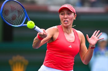 Mar 11, 2025; Indian Wells, CA, USA; Jessica Pegula (USA) hits a ball against Elina Svitolina (UKR) at Indian Well Tennis Garden. Mandatory Credit: Jonathan Hui-Imagn Images