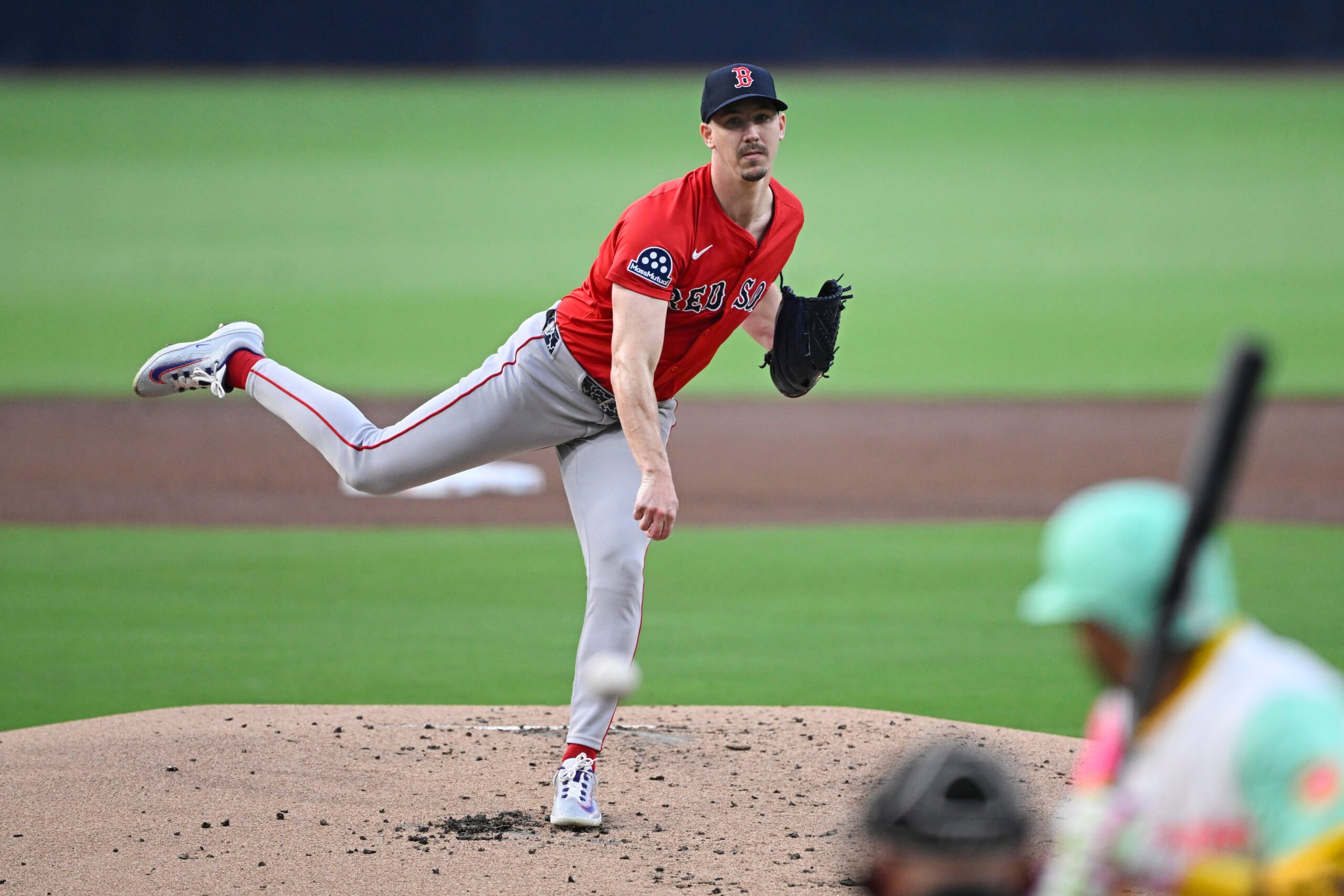Aug 8, 2025; San Diego, California, USA; Boston Red Sox starting pitcher Walker Buehler (0) delivers during the first inning against the San Diego Padres at Petco Park. Mandatory Credit: Denis Poroy-Imagn Images
