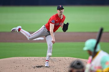 Aug 8, 2025; San Diego, California, USA; Boston Red Sox starting pitcher Walker Buehler (0) delivers during the first inning against the San Diego Padres at Petco Park. Mandatory Credit: Denis Poroy-Imagn Images