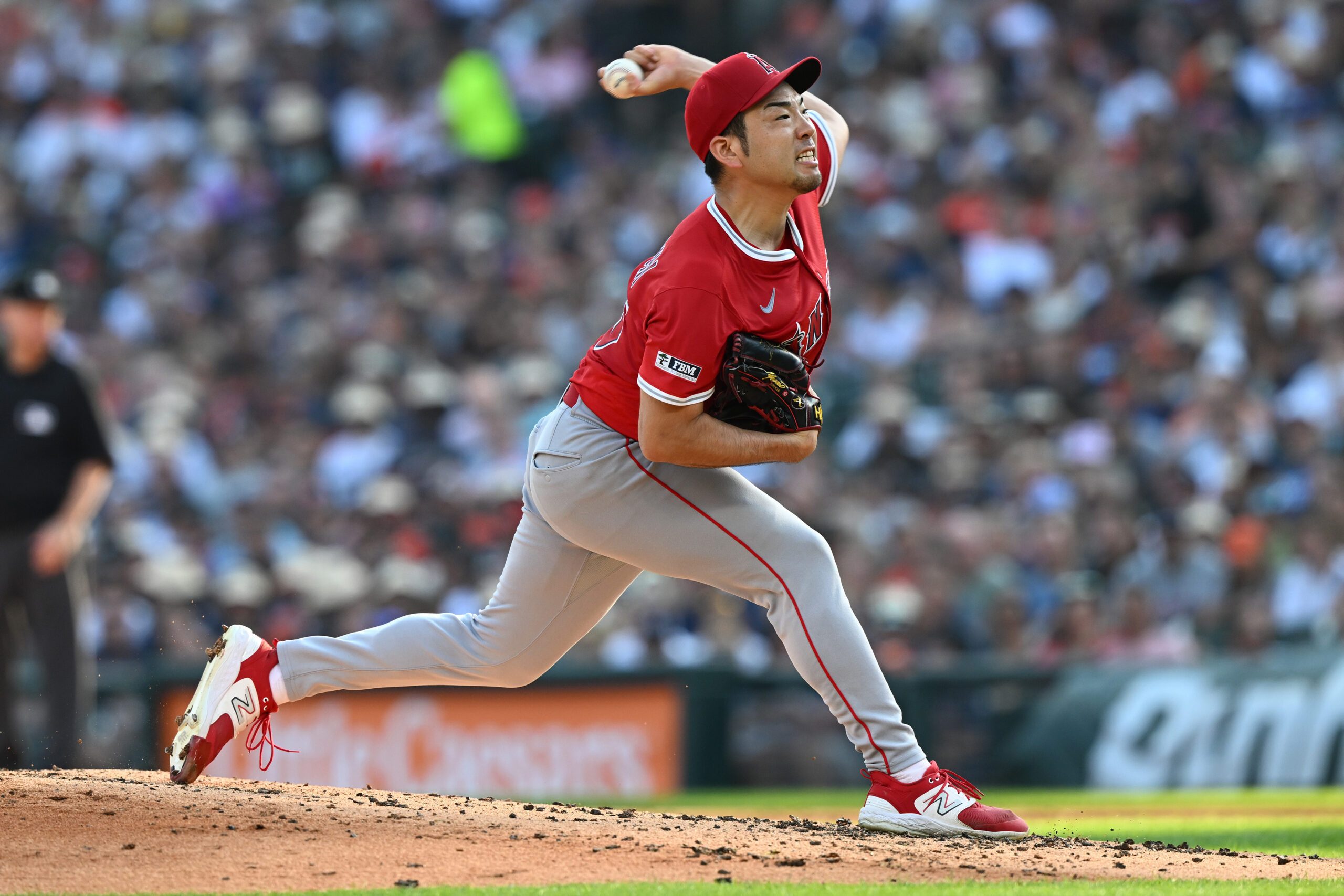 Aug 9, 2025; Detroit, Michigan, USA;  Los Angeles Angels starting pitcher Yusei Kikuchi (16) throws a pitch against the Detroit Tigers in the second  inning at Comerica Park. Mandatory Credit: Lon Horwedel-Imagn Images