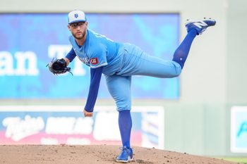 Aug 9, 2025; Minneapolis, Minnesota, USA; Kansas City Royals starting pitcher Noah Cameron (65) throws a pitch against the Minnesota Twins in the first inning at Target Field. Mandatory Credit: Matt Blewett-Imagn Images