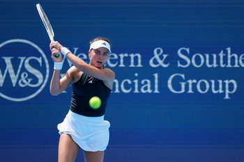 Aug 12, 2025; Cincinnati, OH, USA; Iva Jovic (USA) returns a shot against Barbora Krejcikova (CZE) during the Cincinnati Open at the Lindner Family Tennis Center. Mandatory Credit: Aaron Doster-Imagn Images
