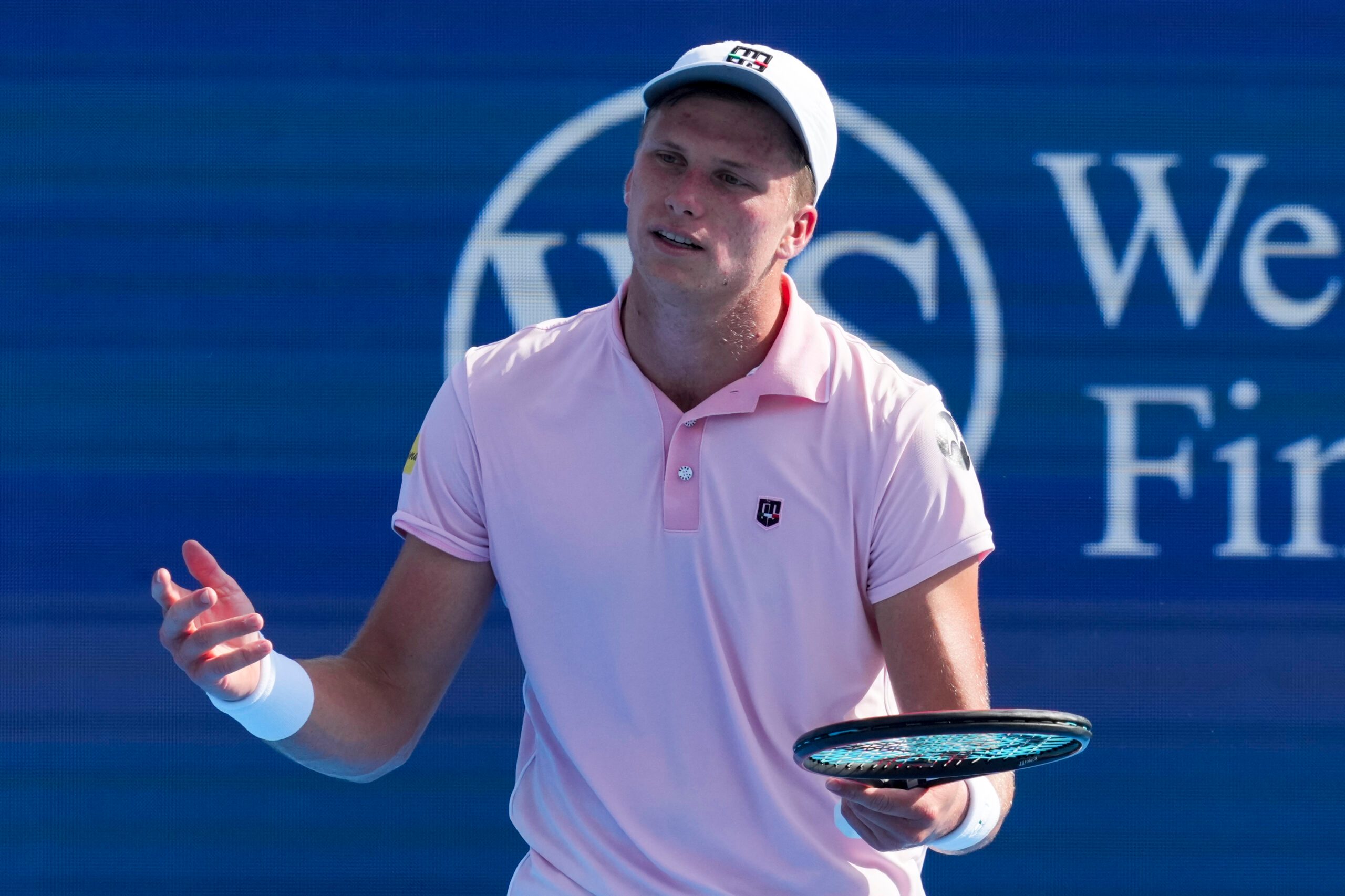 Aug 12, 2025; Cincinnati, OH, USA; Jenson Brooksby (USA) reacts after returning a shot against Karen Khachanov (RUS) during the Cincinnati Open at the Lindner Family Tennis Center. Mandatory Credit: Aaron Doster-Imagn Images