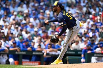 Aug 18, 2025; Chicago, Illinois, USA;  Milwaukee Brewers pitcher Freddy Peralta (51) delivers during the second inning against the Chicago Cubs at Wrigley Field. Mandatory Credit: Matt Marton-Imagn Images