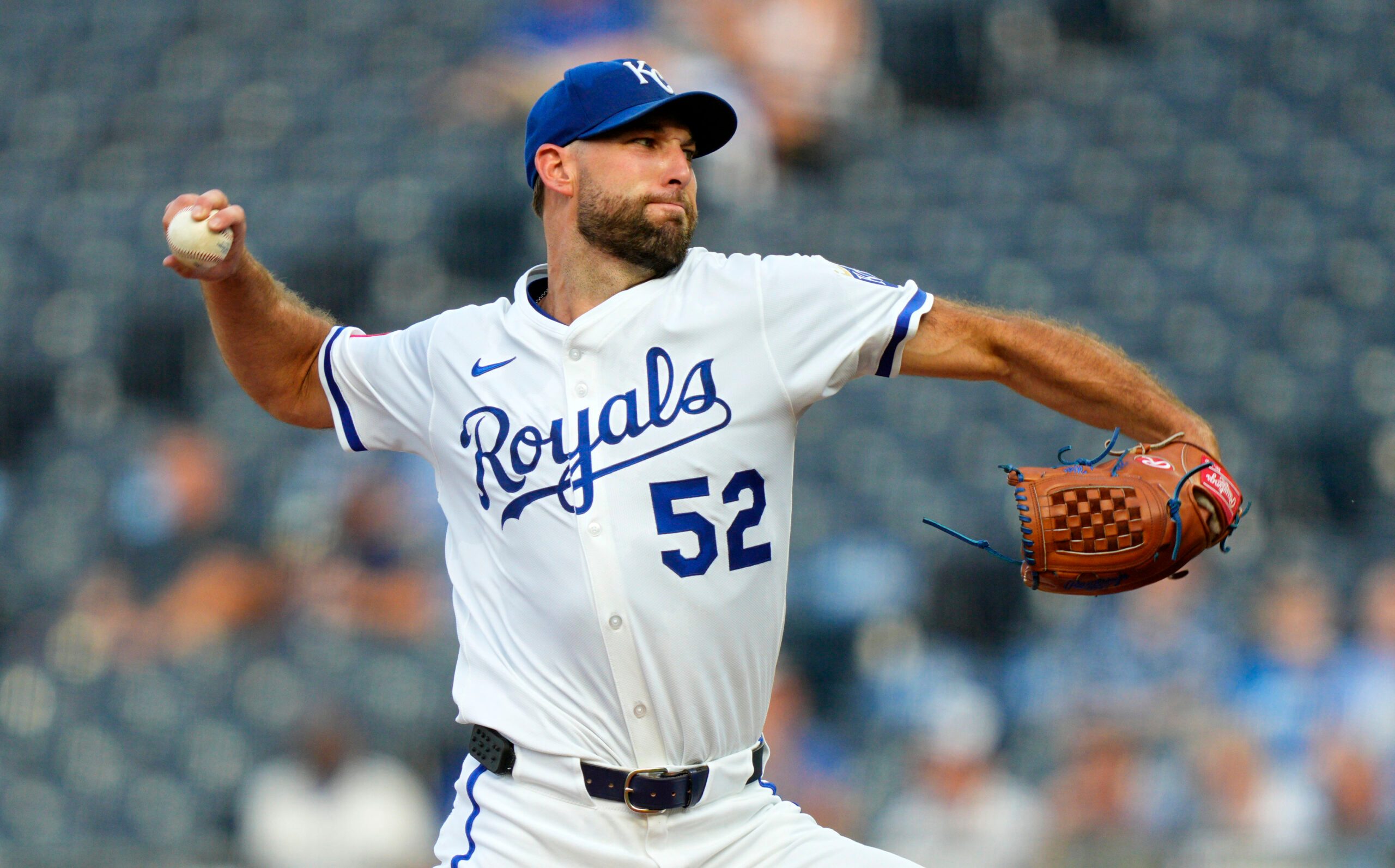 Aug 18, 2025; Kansas City, Missouri, USA; Kansas City Royals starting pitcher Michael Wacha (52) pitches during the first inning against the Texas Rangers at Kauffman Stadium. Mandatory Credit: Jay Biggerstaff-Imagn Images