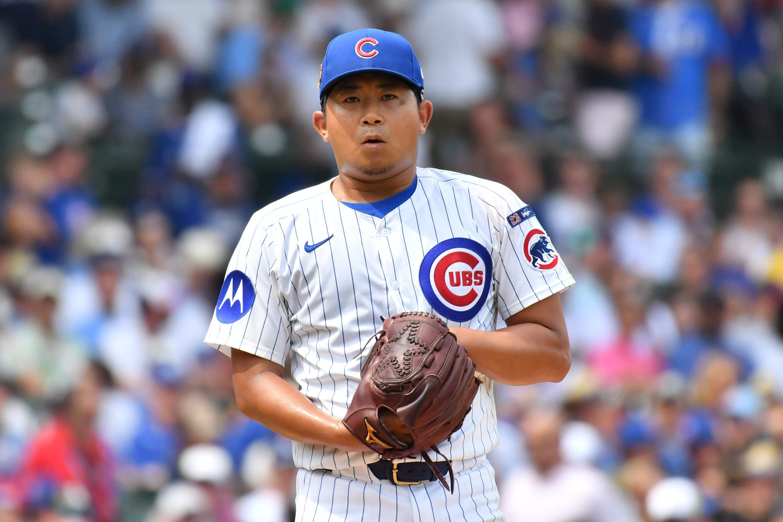 Aug 16, 2025; Chicago, Illinois, USA; Chicago Cubs starting pitcher Shota Imanaga (18) prepares to pitch during a game against the Pittsburgh Pirates at Wrigley Field. Mandatory Credit: Patrick Gorski-Imagn Images