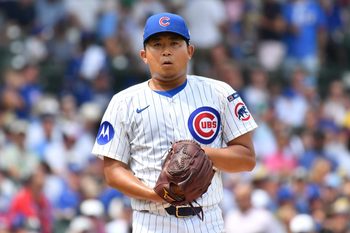 Aug 16, 2025; Chicago, Illinois, USA; Chicago Cubs starting pitcher Shota Imanaga (18) prepares to pitch during a game against the Pittsburgh Pirates at Wrigley Field. Mandatory Credit: Patrick Gorski-Imagn Images