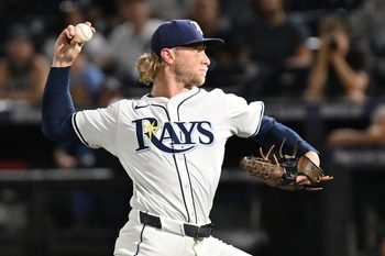 Aug 19, 2025; St. Petersburg, Florida, USA; Tampa Bay Rays starting pitcher Shane Baz (11) throws a pitch in the first inning against the New York Yankees  at George M. Steinbrenner Field. Mandatory Credit: Jonathan Dyer-Imagn Images