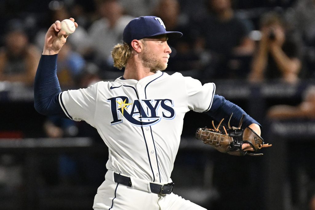 Aug 19, 2025; St. Petersburg, Florida, USA; Tampa Bay Rays starting pitcher Shane Baz (11) throws a pitch in the first inning against the New York Yankees at George M. Steinbrenner Field. Mandatory Credit: Jonathan Dyer-Imagn Images