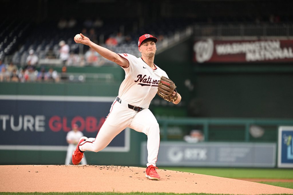 Aug 20, 2025; Washington, District of Columbia, USA; Washington Nationals relief pitcher Brad Lord (61) throws a pitch against the New York Mets during the first inning at Nationals Park. Mandatory Credit: Rafael Suanes-Imagn Images