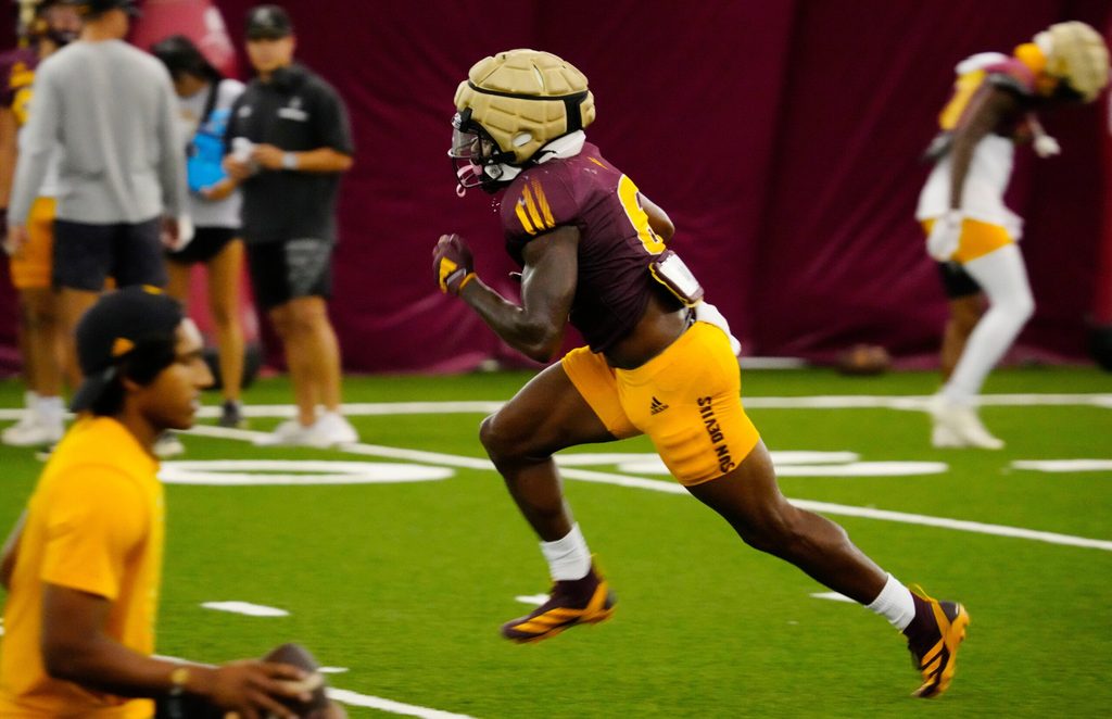 Arizona State running back Kanye Udoh (6) runs in a drill during a practice inside the Verde Dickey Dome in Tempe on Aug. 12, 2025.